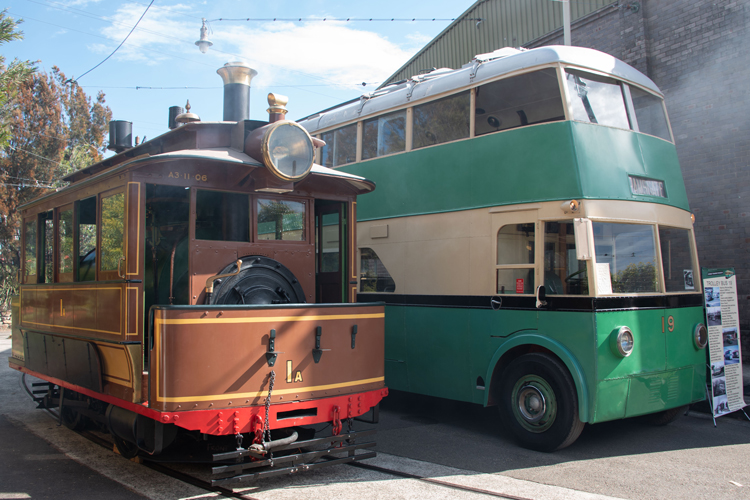 A couple of trains are parked next to each other

Description automatically generated with low confidence