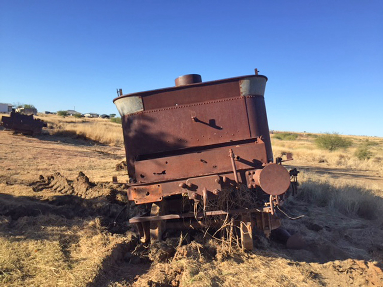 A picture containing sky, outdoor, grass, farm machine

Description automatically generated