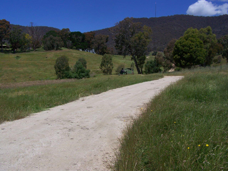 A picture containing grass, outdoor, sky, path

Description automatically generated