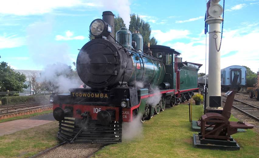 A picture containing railroad, sky, outdoor, transport

Description automatically generated