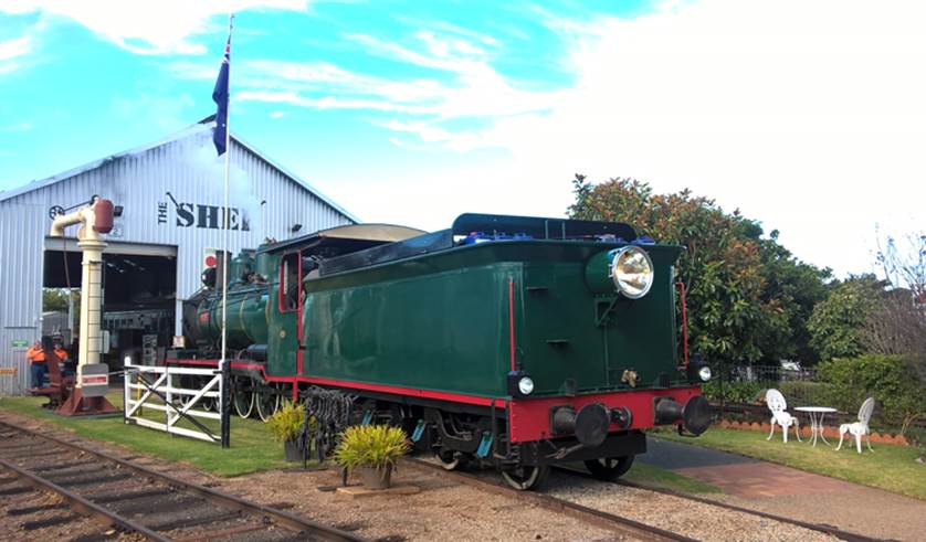 A picture containing railroad, outdoor, transport, sky

Description automatically generated