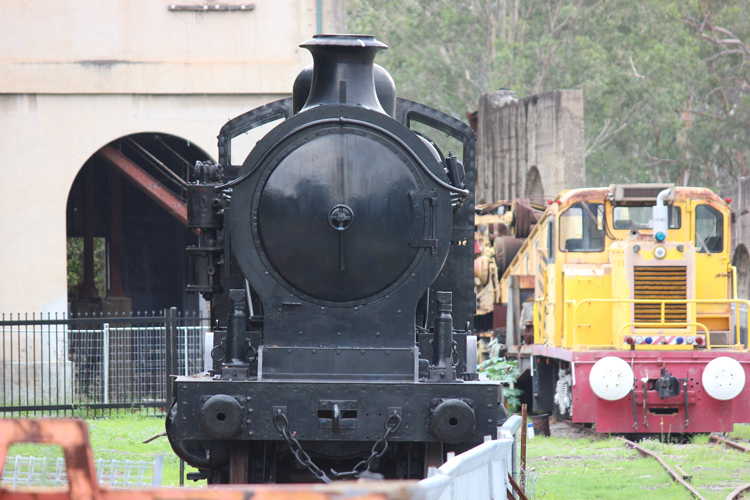 A picture containing train, grass, outdoor, track

Description automatically generated