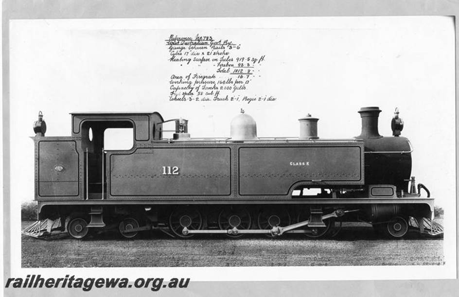 A picture containing text, old, black, train
Description automatically generated