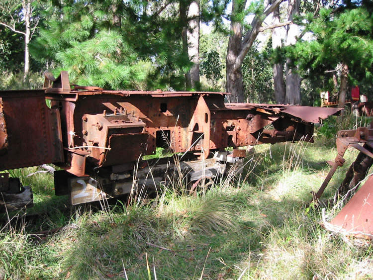 A picture containing grass, outdoor, tree, farm machine

Description automatically generated