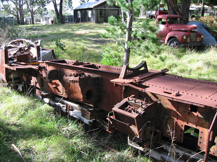 A picture containing grass, outdoor, tree, farm machine

Description automatically generated