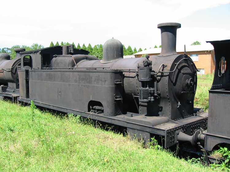 A picture containing grass, train, sky, track

Description automatically generated